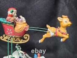 Enesco Roudolph the Red Nosed Reindeer Illuminated Action Musical 588415